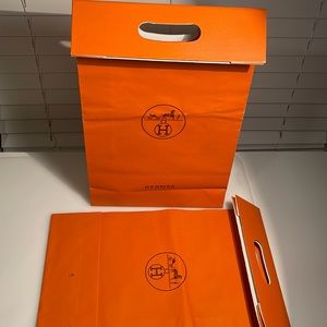 Two 100% authentic Hermes shopping bags